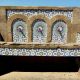 A traditionally tiled drinking fountain at Essaouira Beach Morocco