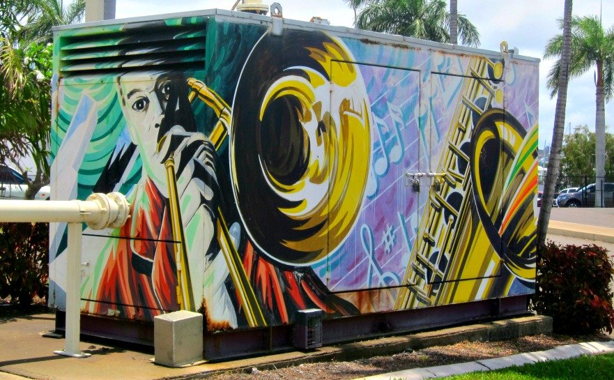 This photo shows a Musician playing Brass on a Townsville Substation Painting