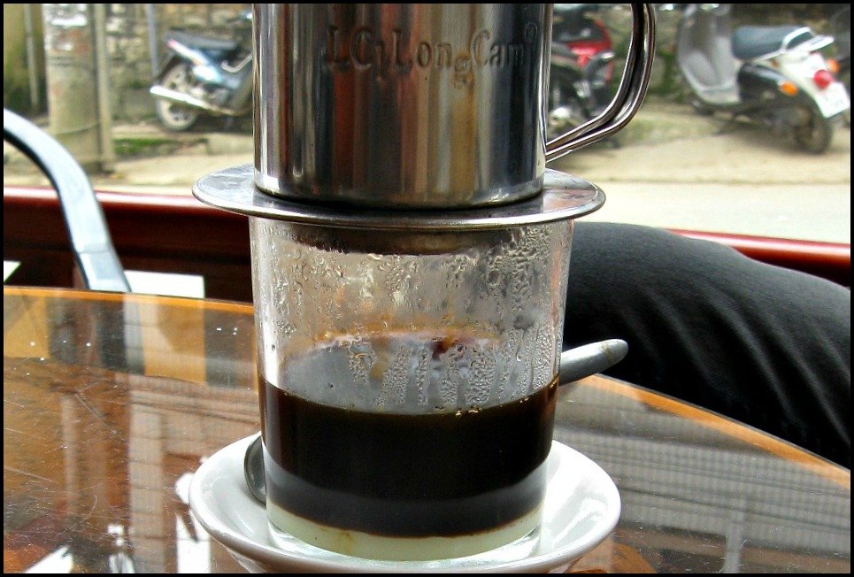 Vietnamese Coffee is filtered onto a layer of Condensed Milk