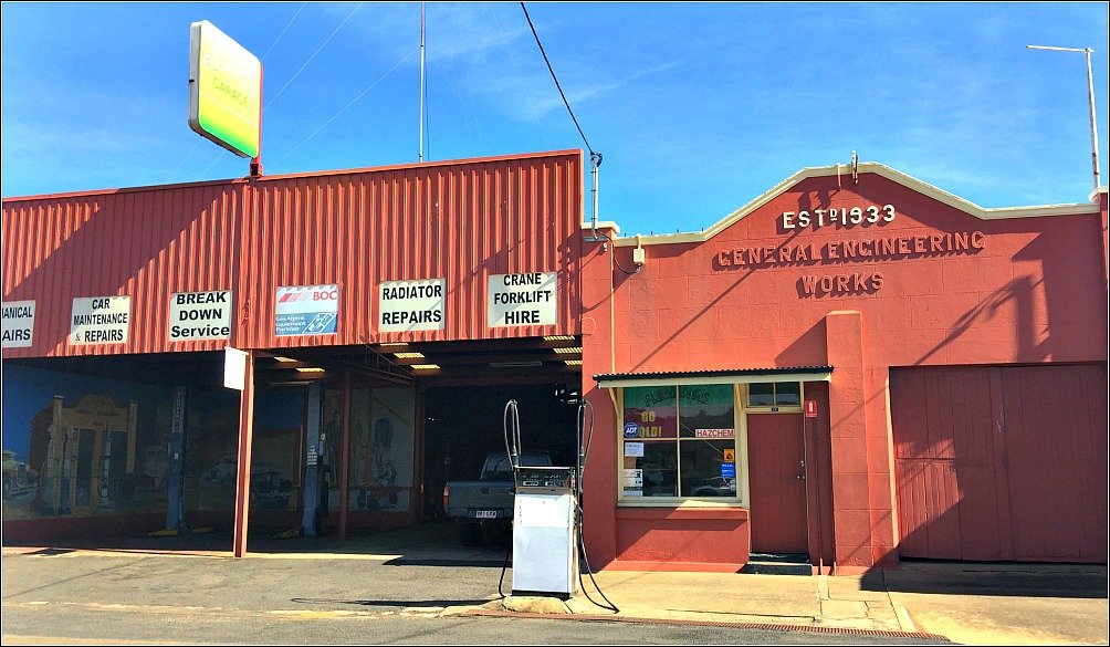 Flemings Garage Nanango is the site of one of Nanango Queensland's 22 Murals by Willie Nelson